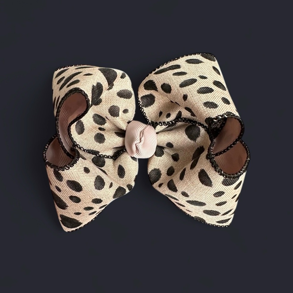 beige and black animal print smocked bow
